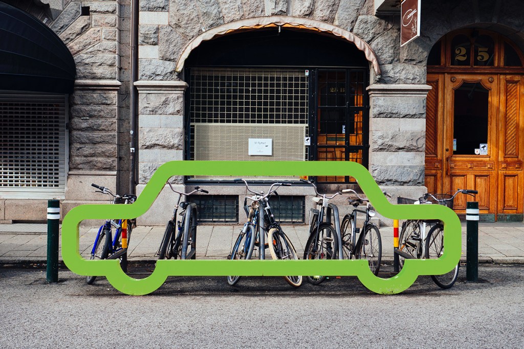 Central cycling rack in front of commercial property