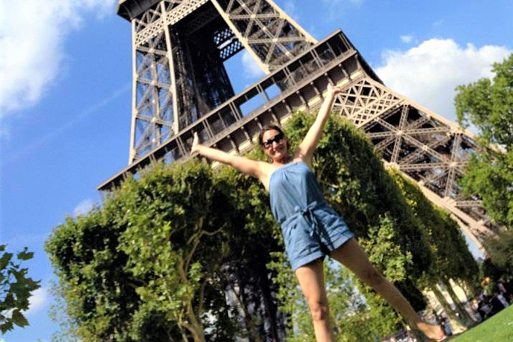 laura atallah in front of the eiffel tower