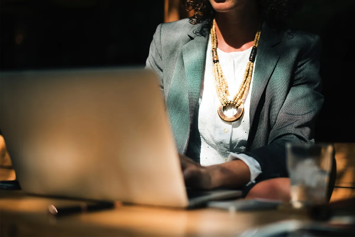 property manager paying vendors on a laptop