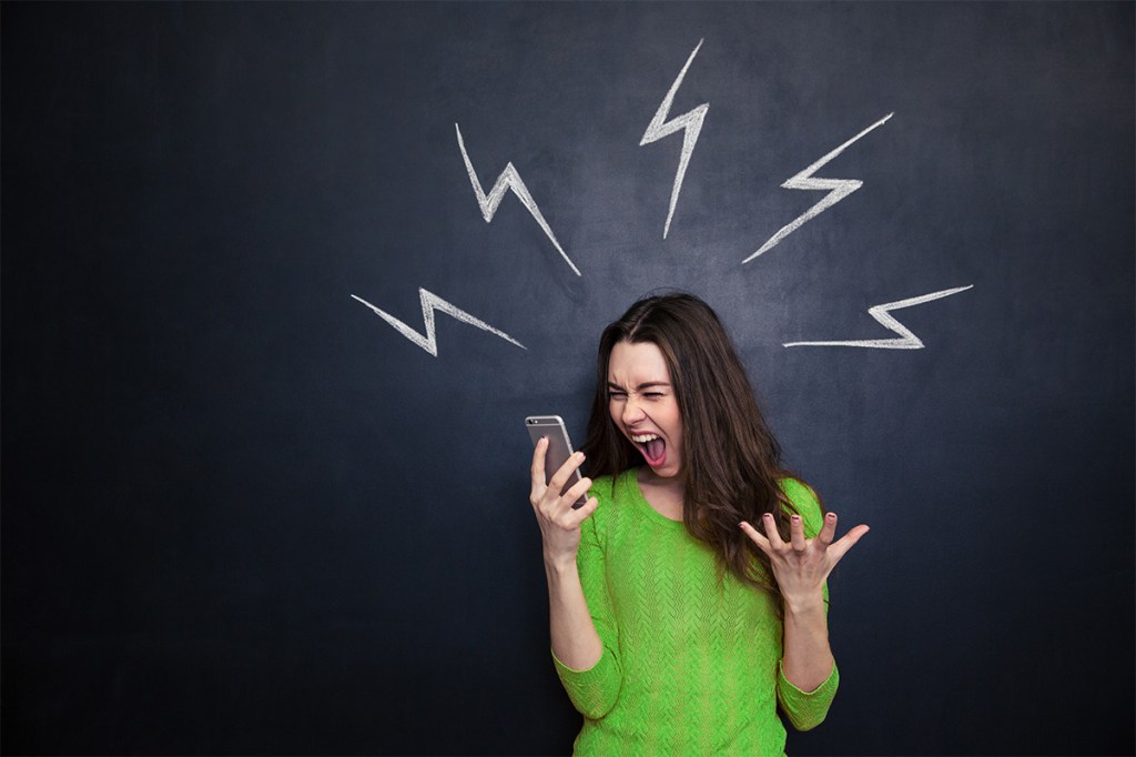 woman shouting renter complaints into a phone