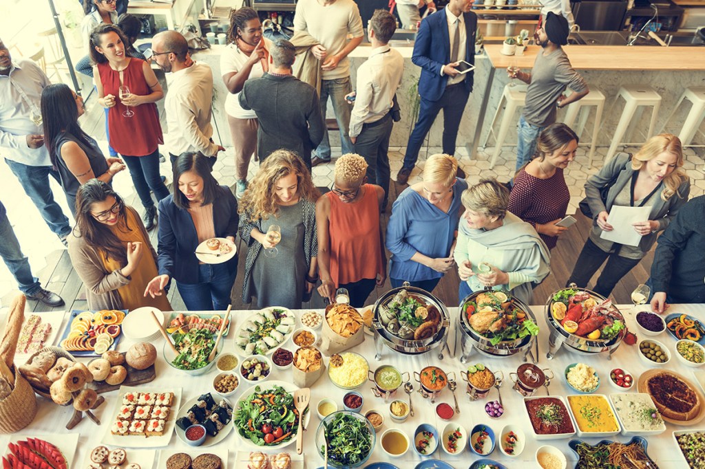 property management holiday party with large food spread