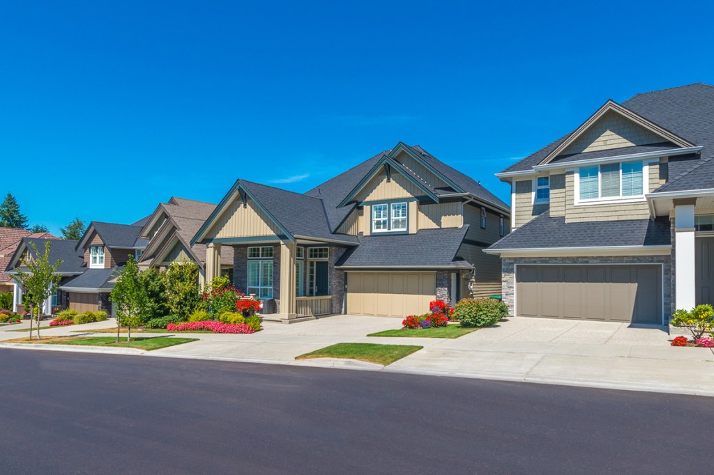 row of single family homes on a sunny day