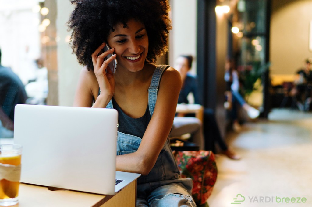 Tenant on the phone, getting great customer service from her property manager