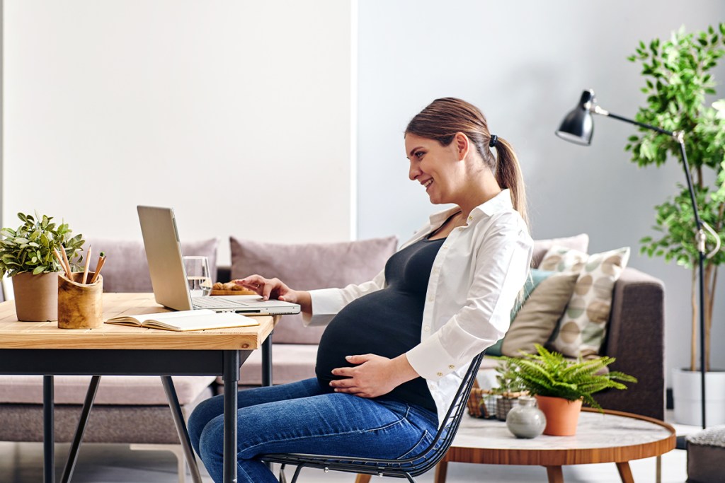 Pregnant woman preparing for maternity leave