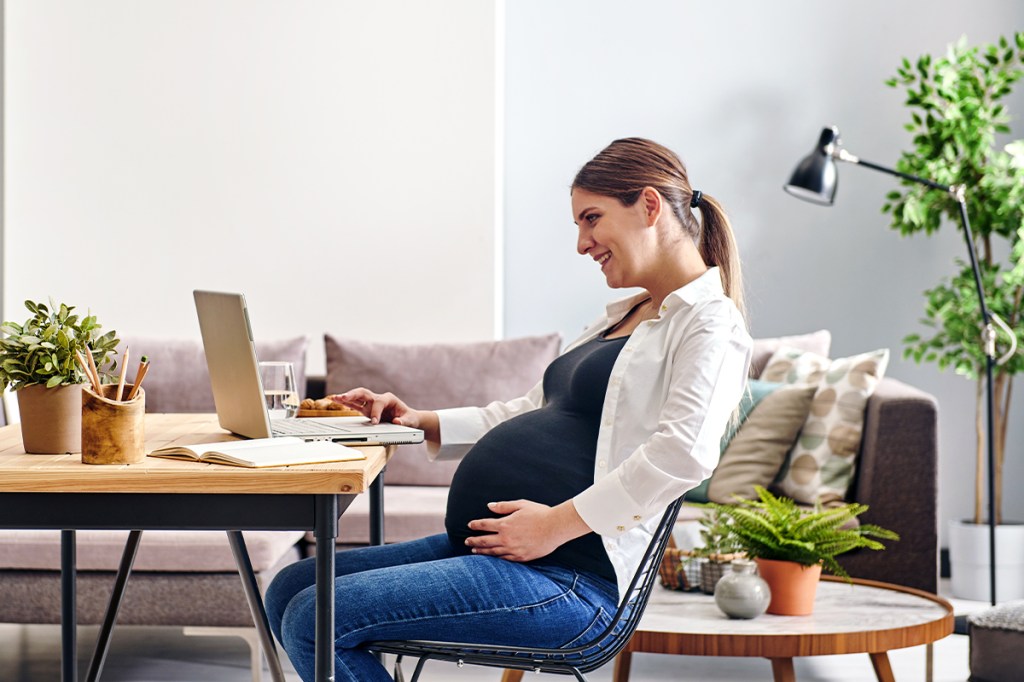 Pregnant woman preparing for maternity leave