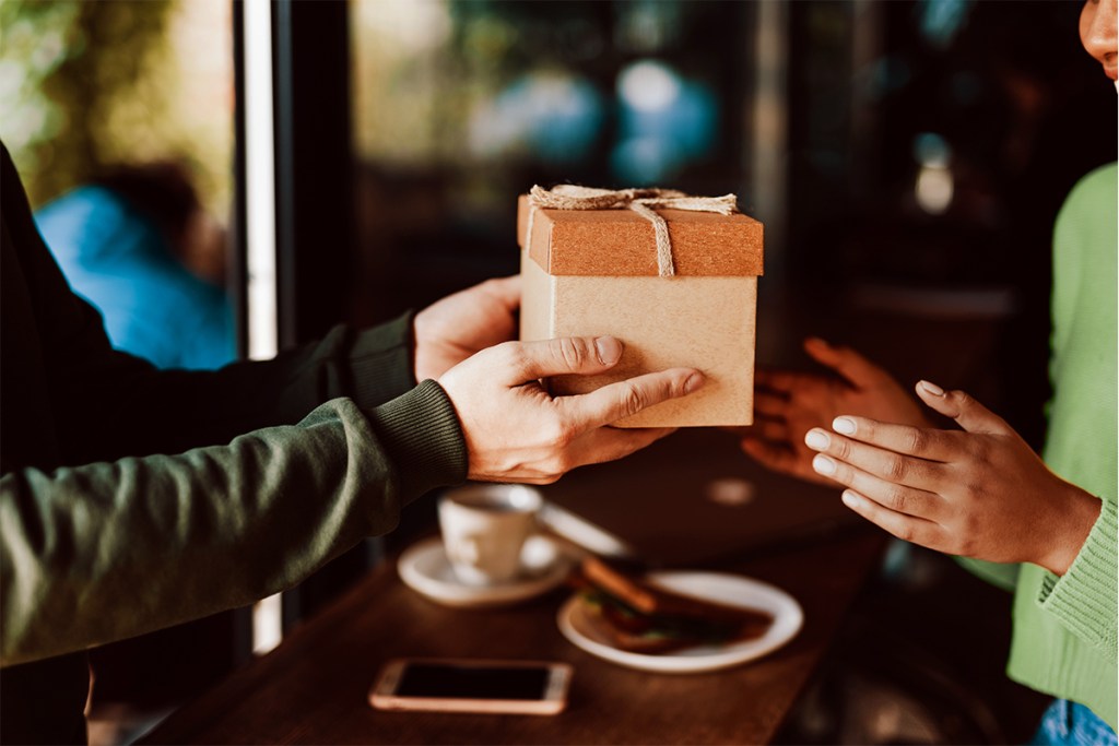 Property manager giving thoughtful gift to resident