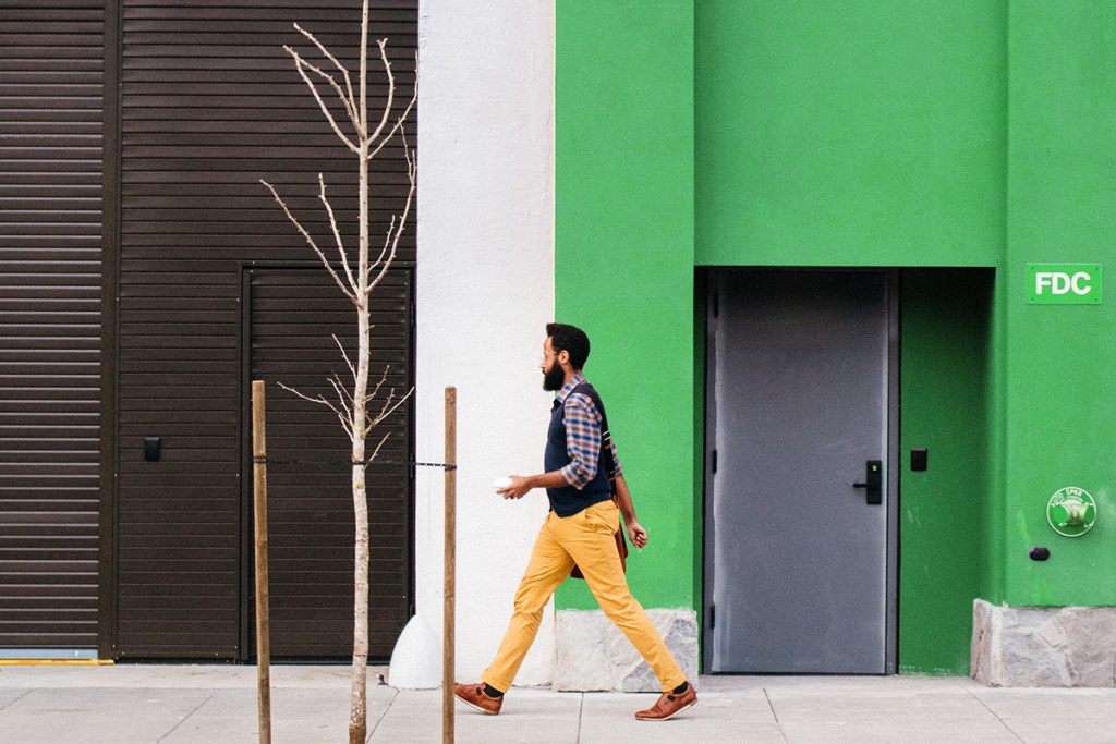 Man taking a walk to stay healthy at work