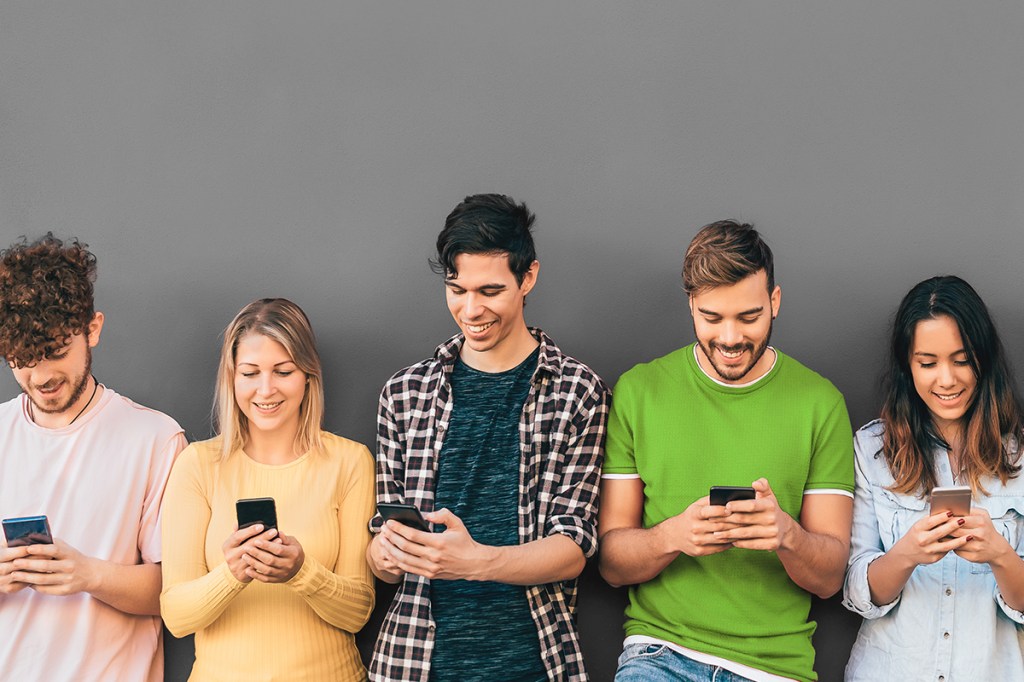 Generation Z renters looking at mobile devices
