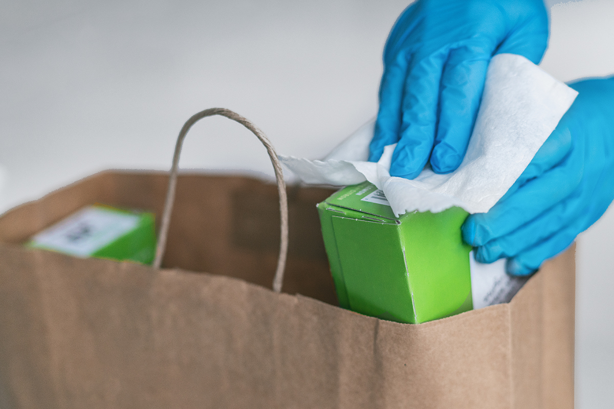 wearing gloves to protect older and vulnerable residents