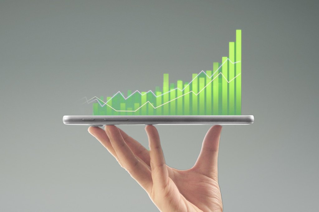 Bar graph coming out of tablet to represent investment management software called Yardi Investment Manager