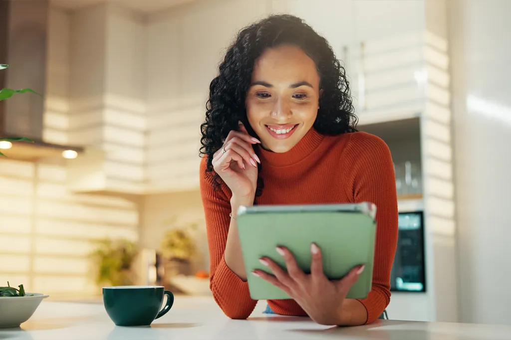 Woman reading on her tablet
