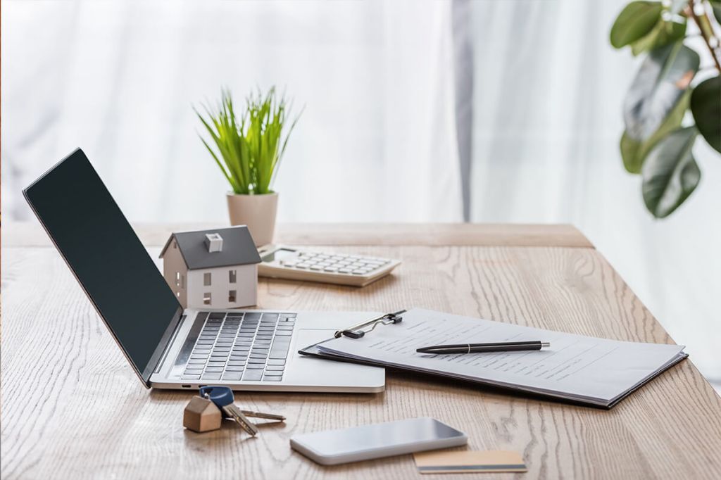 Image of a laptop professionals can use to get their property management certifications