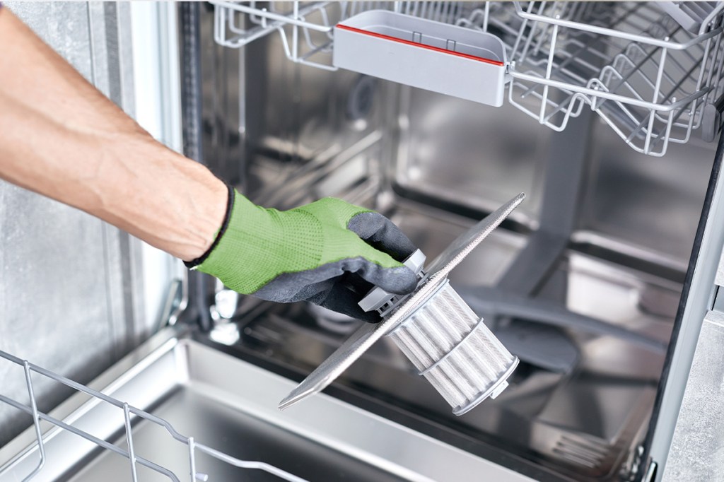 Image of dishwasher filtering being changed: Property Maintenance Hacks Based On Real Renter Data