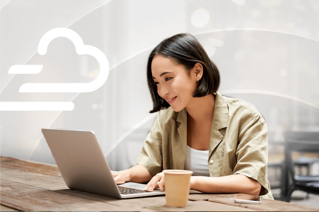 Image of young woman using laptop, for article "Favorite Breeze Features, According To Our Customer Support Team"