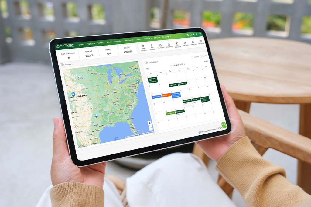 Tablet with dashboard introducing 15 Best Features Of Property Management Software