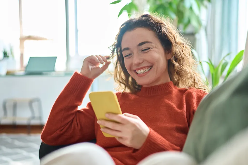 Woman smiling on couch