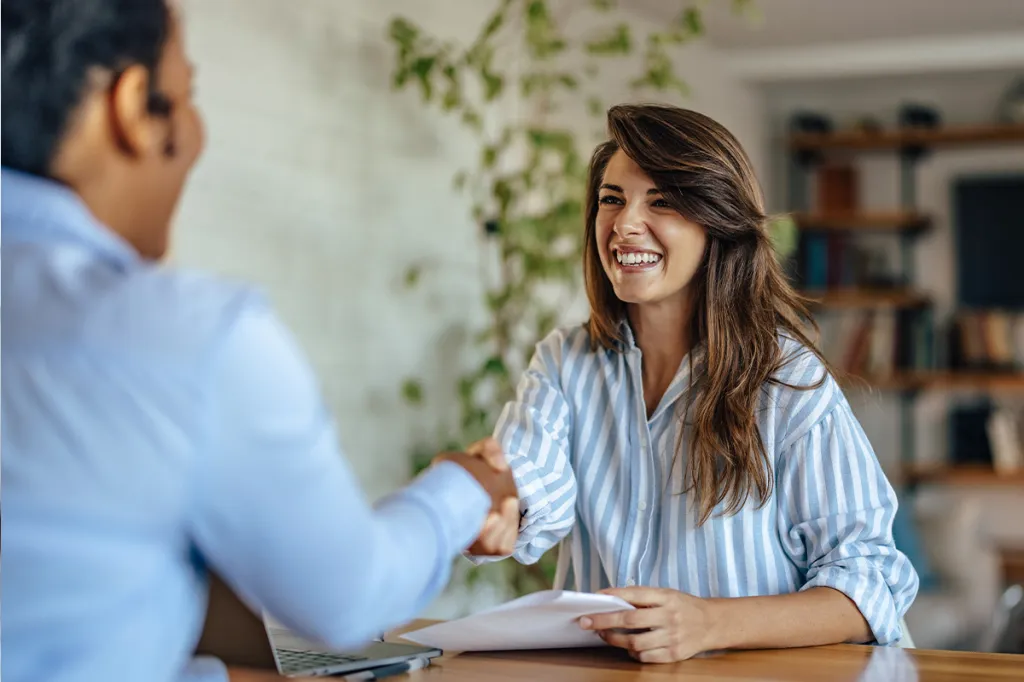 Two professionals shaking hands
