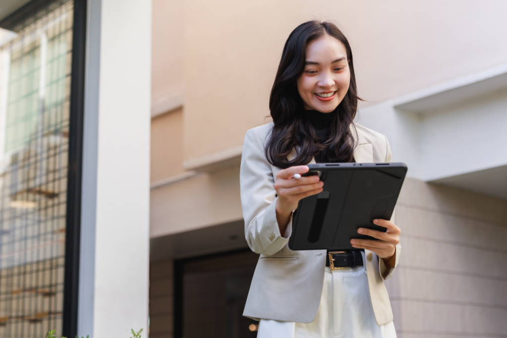 Property manager company owner looking at tablet